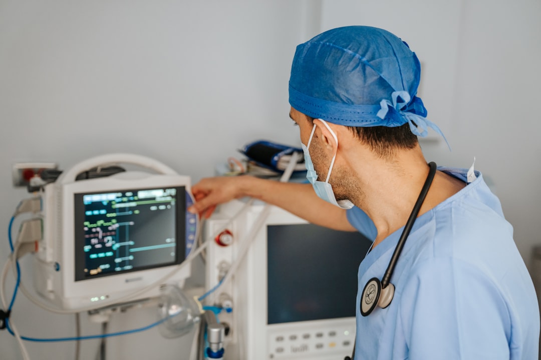 Hospital staff viewing integrated patient data on a digital dashboard