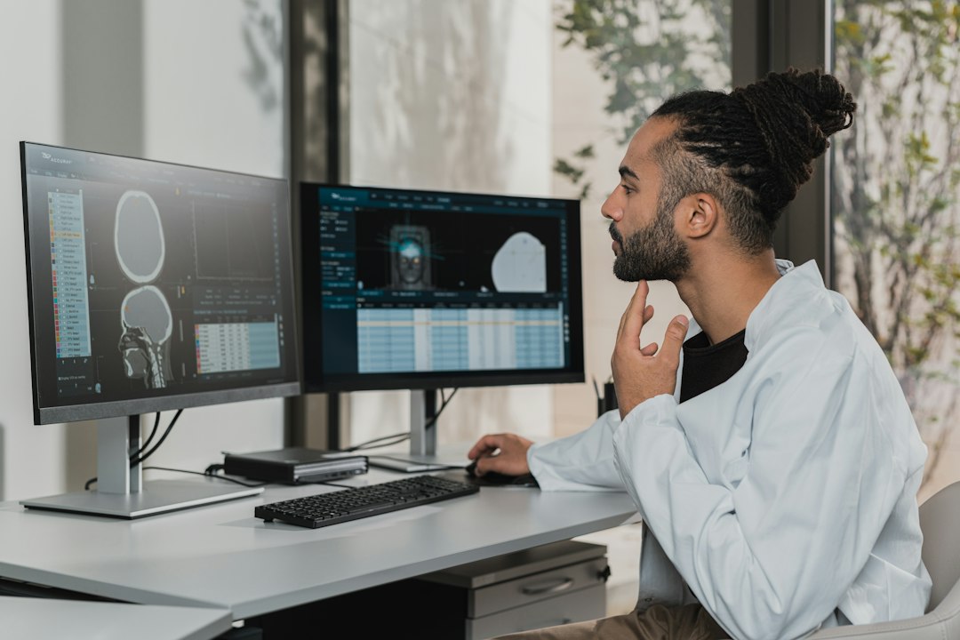 MSP technician monitoring AI-driven dashboards in a network operations center