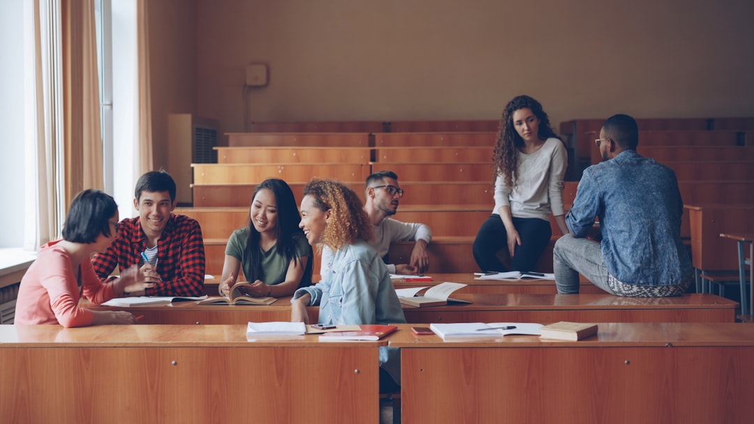 University students and a professor discussing artificial intelligence and ethics in a classroom