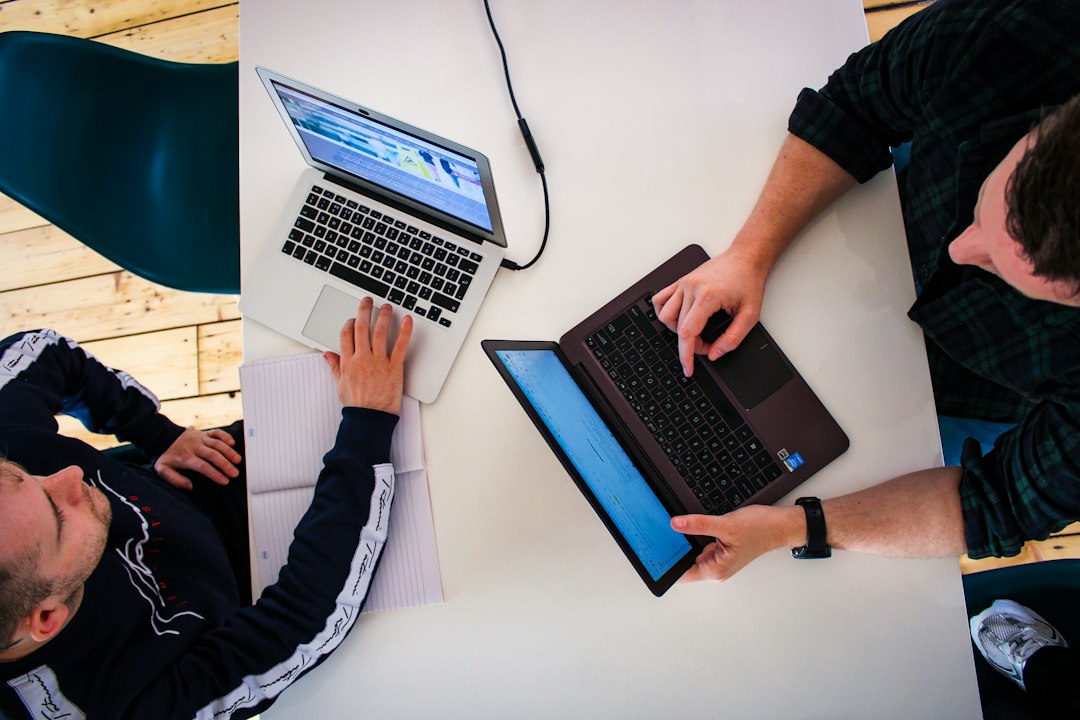 Employees completing digital onboarding with AI-assisted training materials
