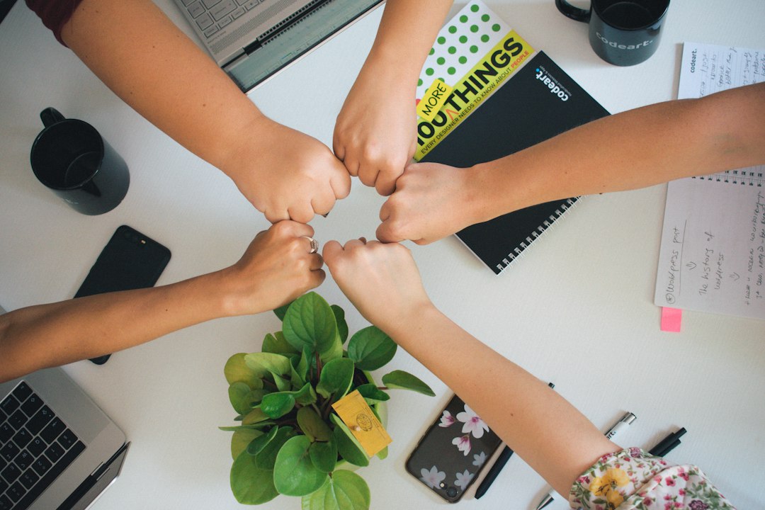 Small business owners collaborating on AI adoption plans