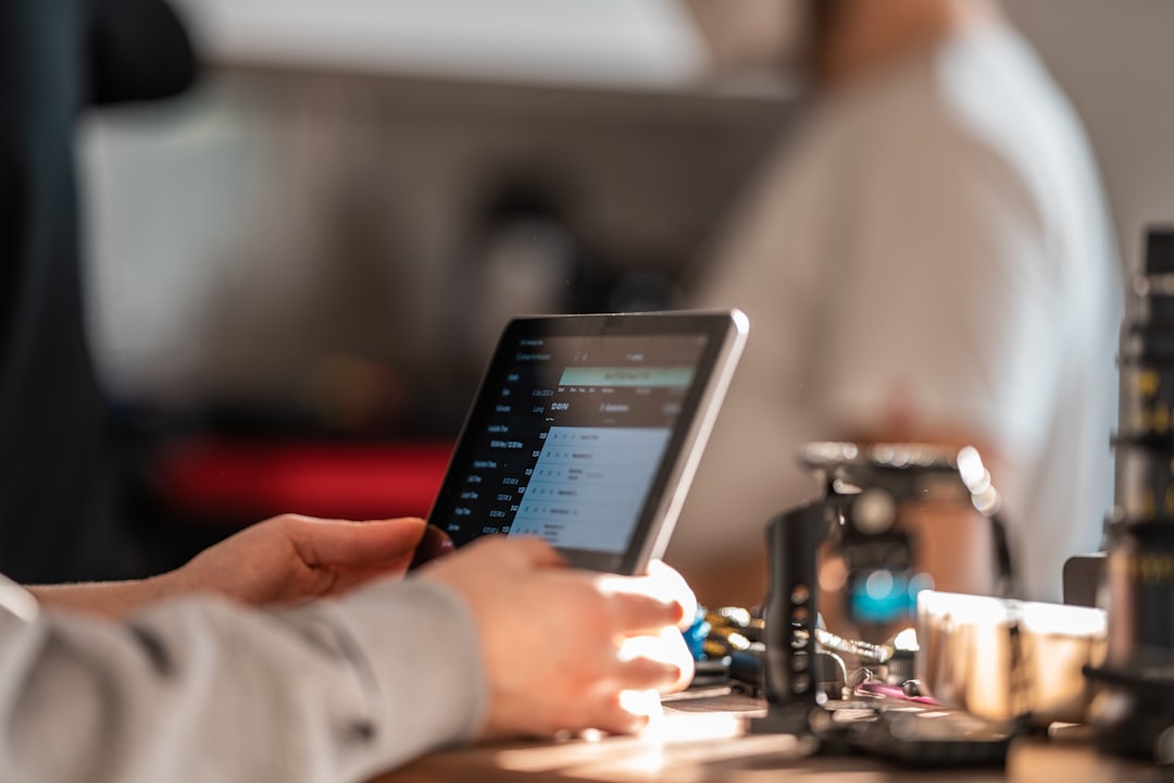 Pest control technician conducting inspection with a tablet