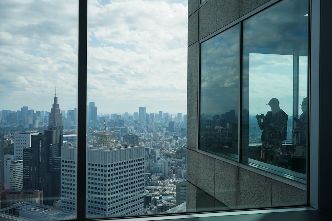 Professional worker worried about AI and job security in a modern office