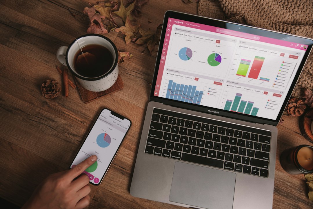 Small business owner using an AI tool on a laptop
