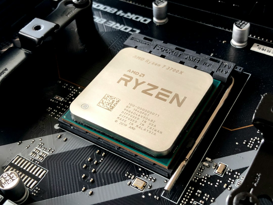 Close-up of an AMD desktop CPU installed on a gaming motherboard
