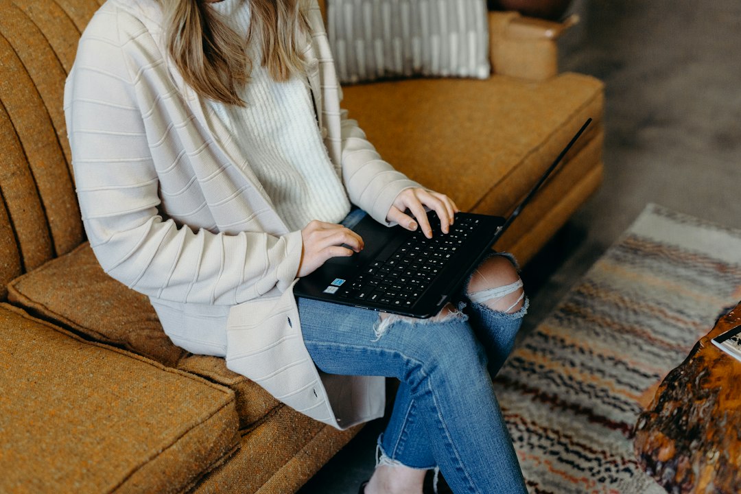 Person using a budget tablet with keyboard and stylus for work