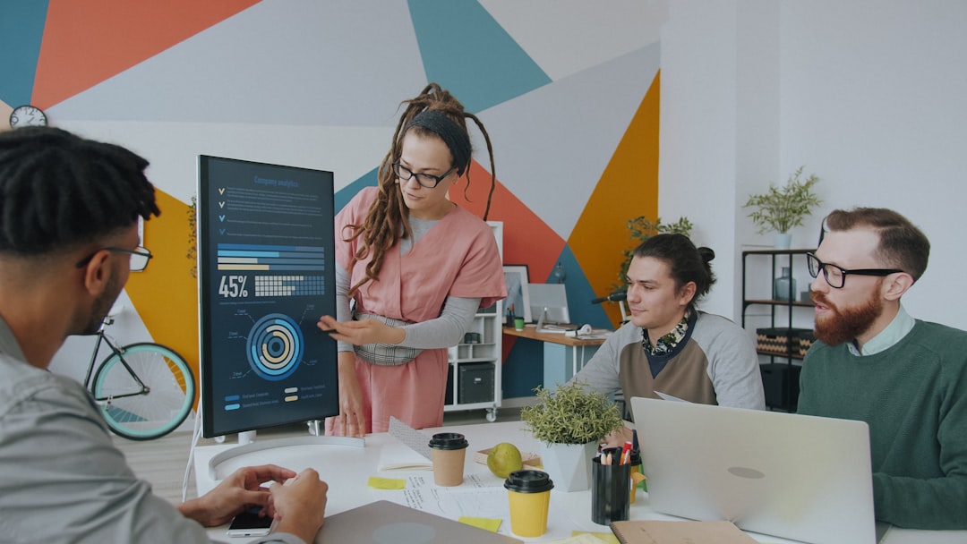 Marketing team analyzing AI dashboard showing user data, privacy settings, and performance metrics