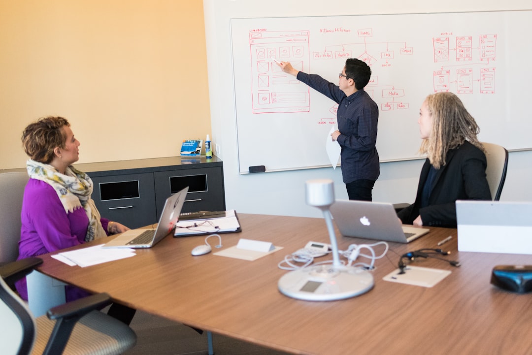 Executive team discussing AI strategy around a conference table