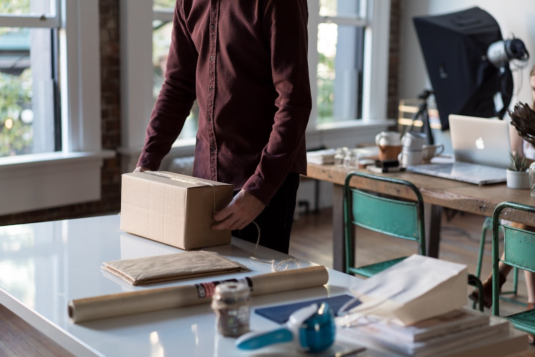 Small business owner preparing packages for an online store