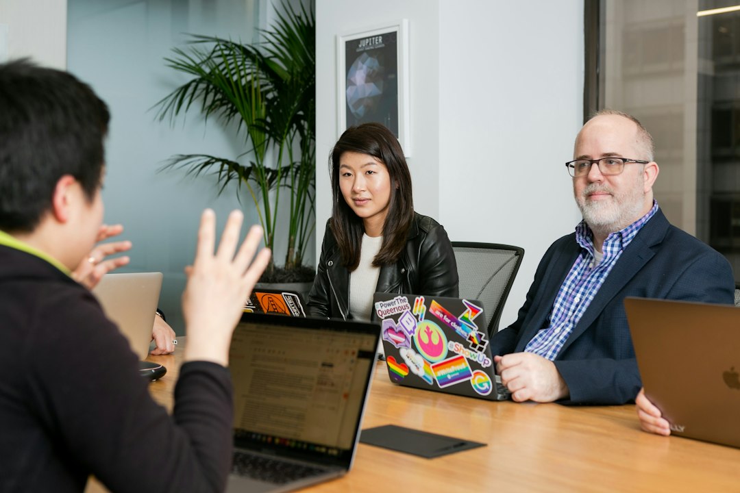 Professionals collaborating in a flexible workplace that reflects the future of work