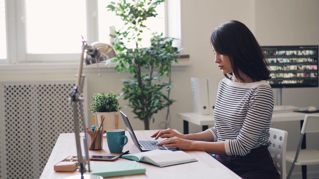 AI assistant helping a user write emails in an office environment