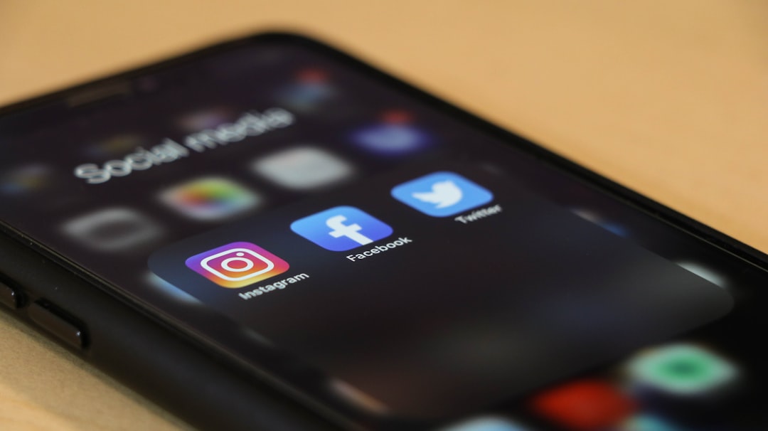 Small business owner managing social media marketing on a smartphone