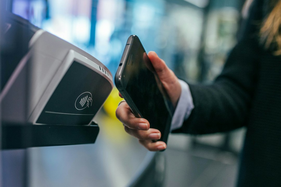 Person using a mobile payment app with an AI assistant interface