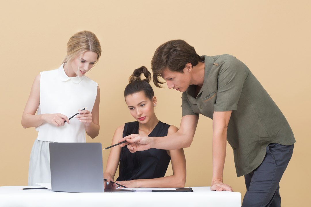 Team in a meeting planning an AI rollout strategy