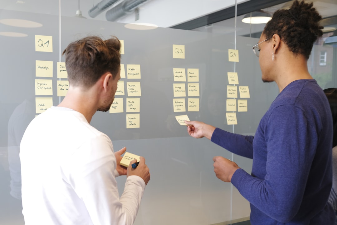 Marketing team planning a content architecture around search intent clusters on a table