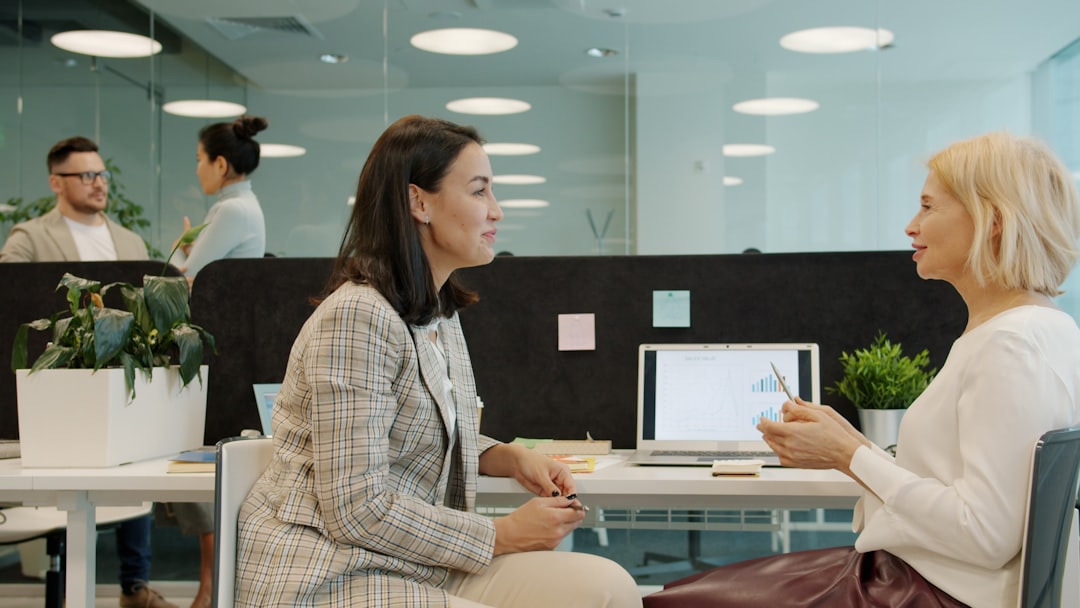 Young workers collaborating in a modern open-plan office