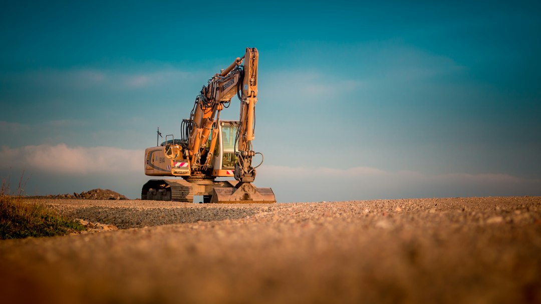 Autonomous excavator working on a large construction site