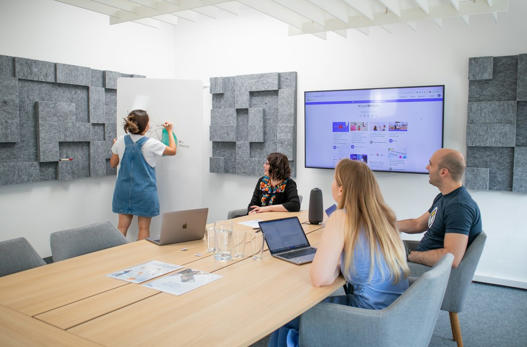 Small business owner discussing digital marketing results with a client