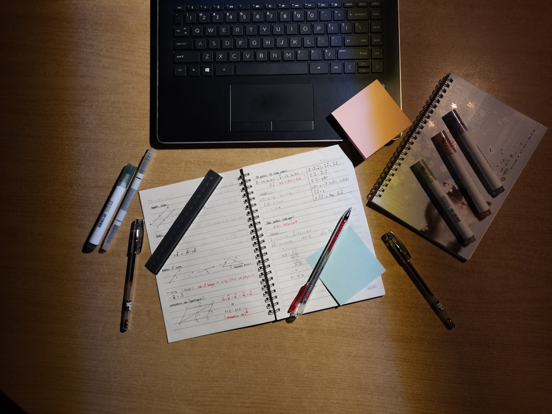 Student planning a daily time-blocked study schedule on a laptop