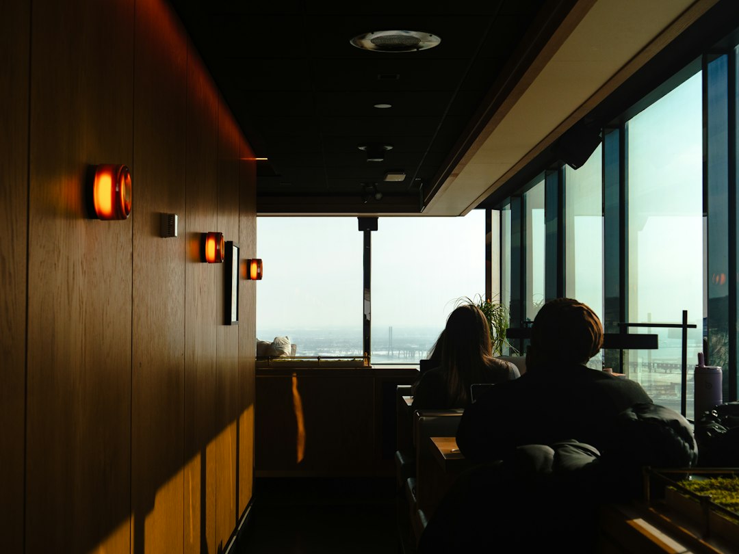 Couple talking closely, focusing on the man’s voice